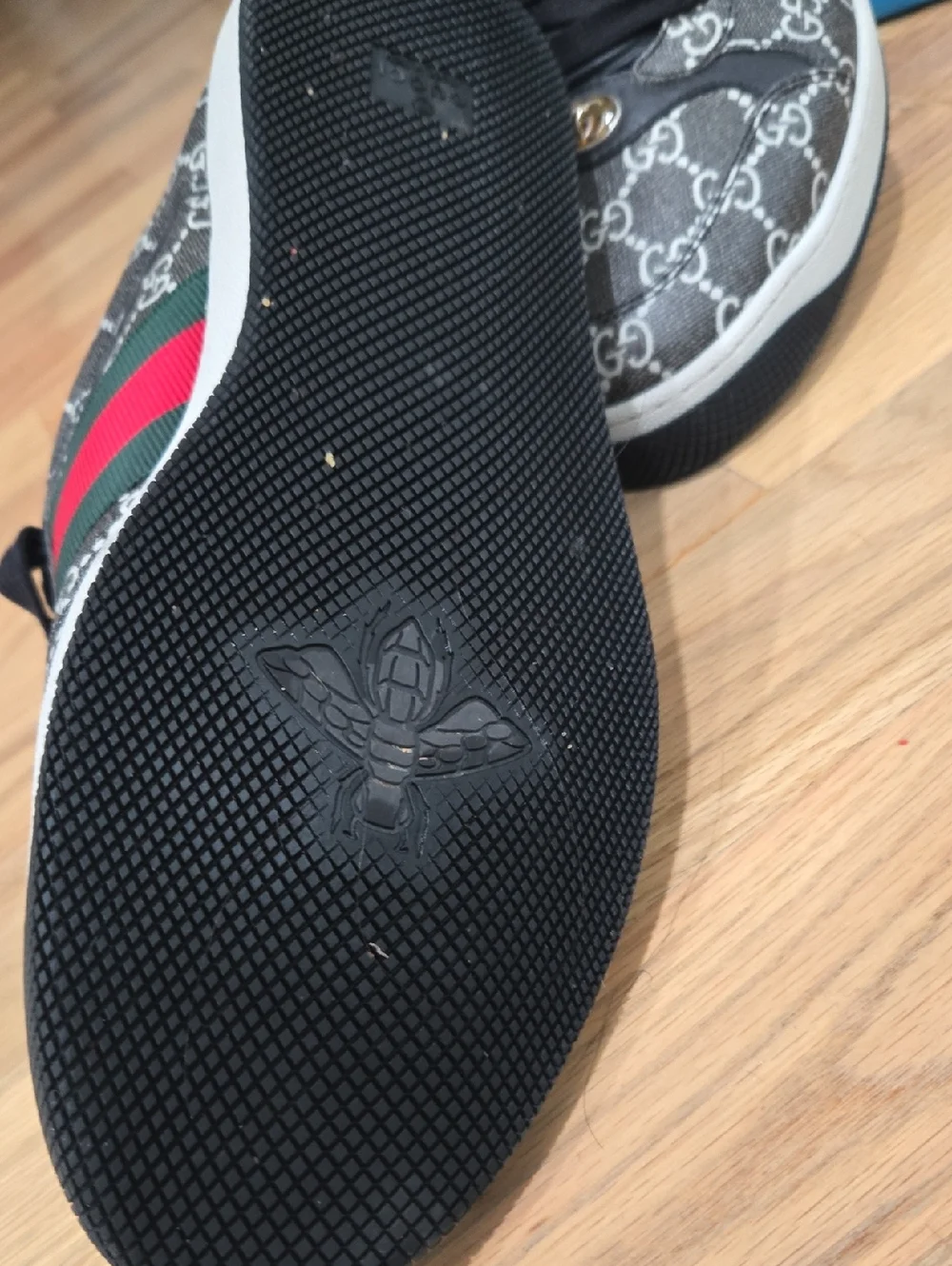 Gucci Black and White GG Monogram Low-Top Sneakers with Gold Accents